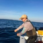 Man Reeling in Tuna