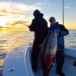 Fisherman with Tuna and Fisherman Fishing Tuna