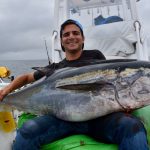 Man Holding Large Bluefin Tuna