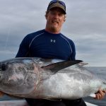 Man Holding Big Tuna