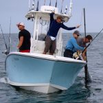 Fisherman on Boat Catching Tuna