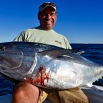 Man Holding Medium Cape Cod Tuna