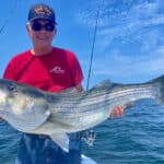 Catch and Release Big Striped Bass on Cape Cod with Reel Deal